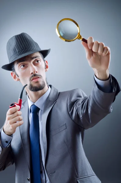 Detective with the smoking pipe — Stock Photo, Image
