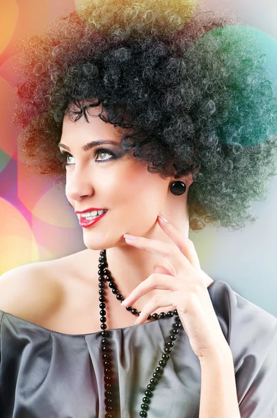 Young attractive girl with afro curly haircut — Stock Photo, Image