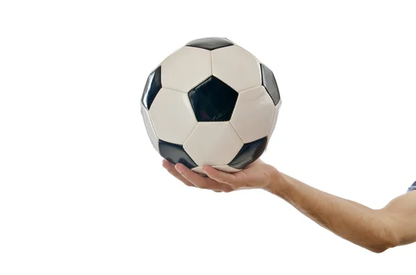 Affärsman anläggning fotboll på vit — Stockfoto