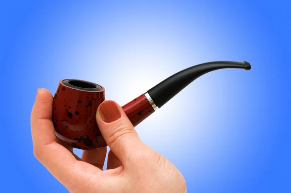 Hand with the smoking pipe — Stock Photo, Image