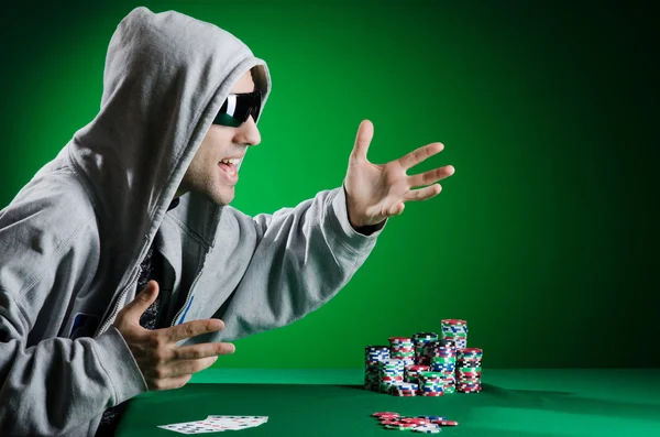 Man playing in the casino — Stock Photo, Image