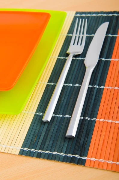 Food utensils on the mat — Stock Photo, Image