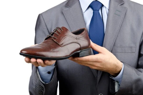 Mann mit einer Auswahl an Schuhen — Stockfoto