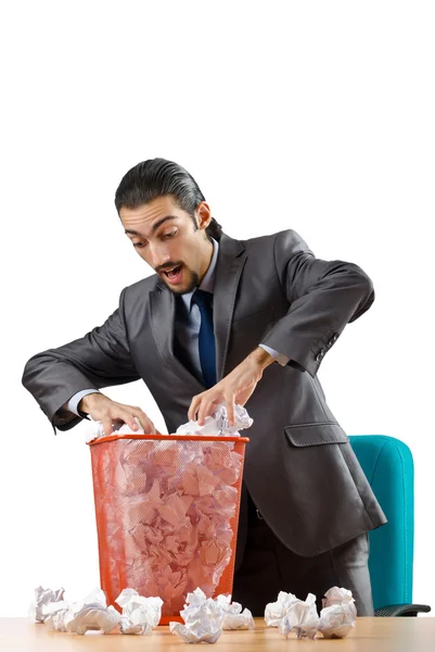 Homem com muito papel desperdiçado — Fotografia de Stock