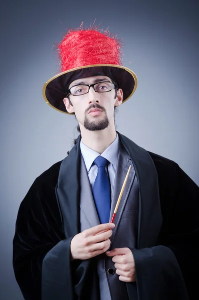 Kouzelník v společenský oblek — Stock fotografie