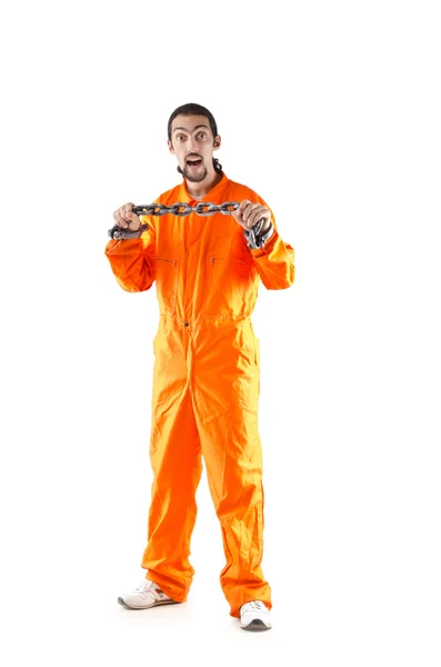 Злочинець в помаранчевому халаті у в'язниці — стокове фото