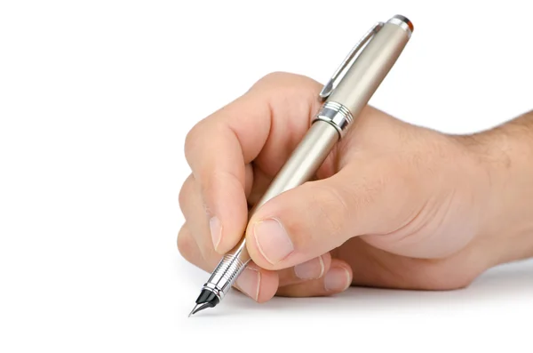 Hand met pen schrijven op wit Rechtenvrije Stockfoto's