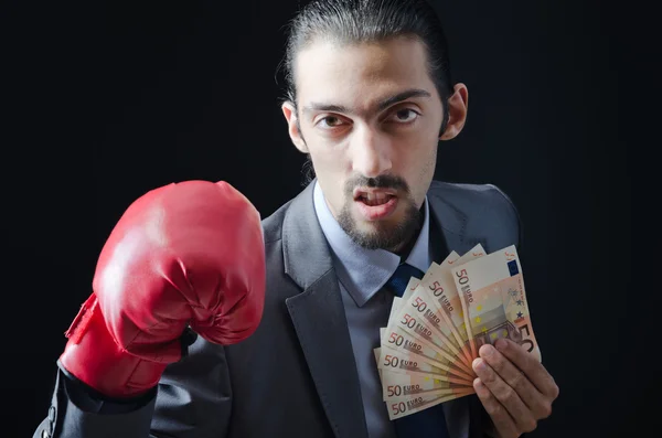 ボクシング グローブとお金を持つ男 — ストック写真