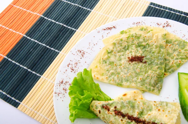 Herb stuffed pancaces in the plate — Stock Photo, Image