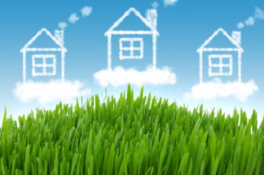 Real estate concept with houses in the sky clipart