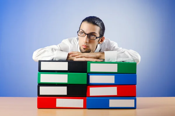 Businessman with many office folders — Stock Photo, Image