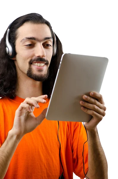 Student listening music with tablet computer — Stock Photo, Image