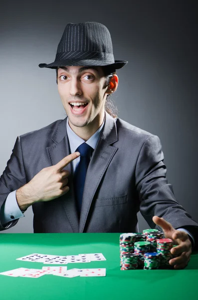 stock image Man playing in the casino