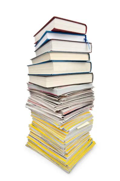 Livros em pilha alta isolado em branco — Fotografia de Stock