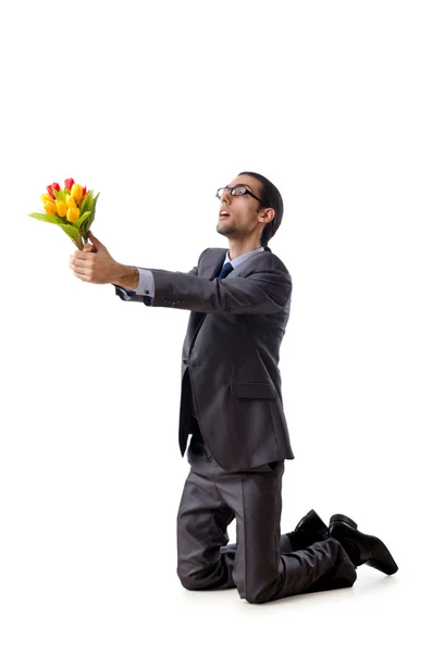 Affärsman erbjuder tulpan blommor — Stockfoto