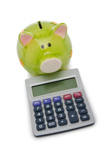 Calculadora e porquinho banco em branco — Fotografia de Stock