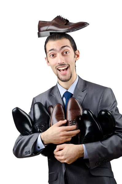 Muž s výběrem obuvi — Stock fotografie