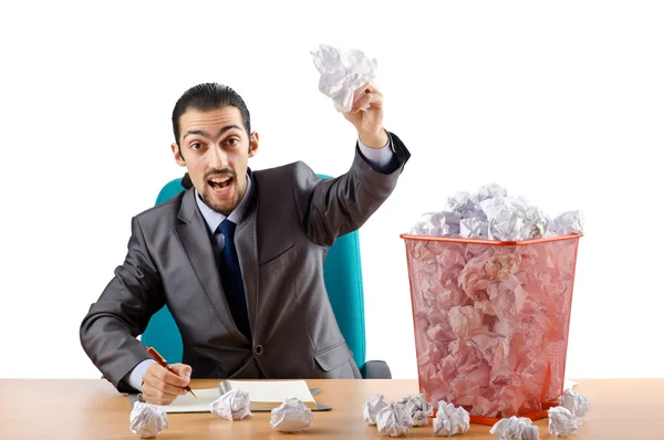 Man med massor av slösat papper — Stockfoto