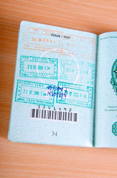 Passport with many stamped visas — Stock Photo, Image
