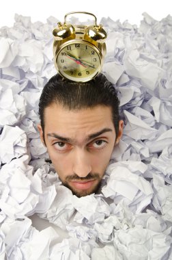 Man with lots of waste paper clipart