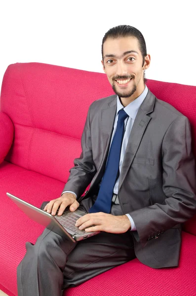 Muž sedící na gauči — Stock fotografie