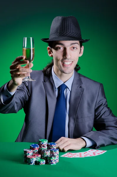 Jugador en casino y fichas —  Fotos de Stock