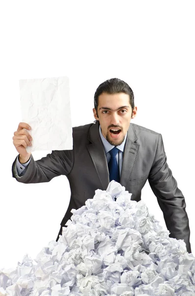Muž se spoustou zmačkaný papír — Stock fotografie