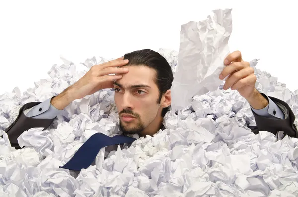 Man with lots of crumpled paper — Stock Photo, Image