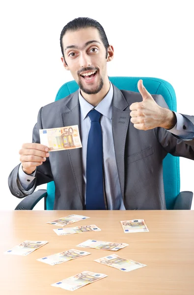 Muž s penězi izolovaných na bílém — Stock fotografie