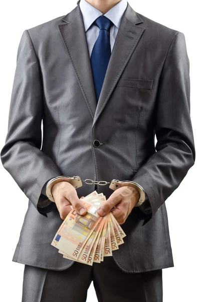 Handcuffed man with euro banknotes — Stock Photo, Image