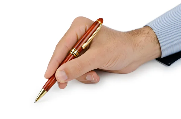 Χέρι με στυλό γραφής σε λευκό — Φωτογραφία Αρχείου