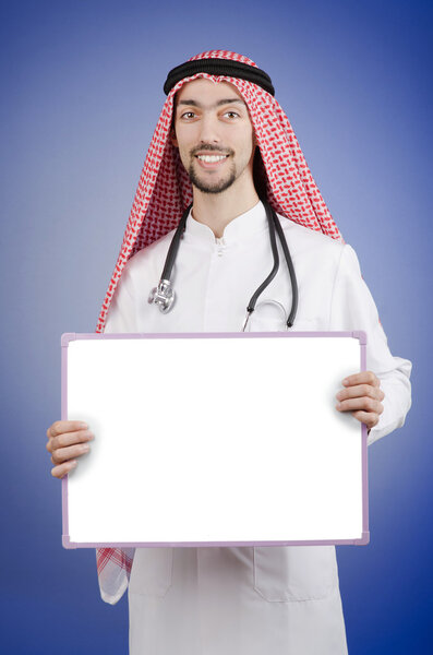 Arab doctor with blank message board