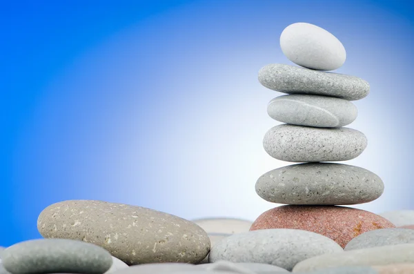 Pebbles stack against gradient background — Stock Photo, Image