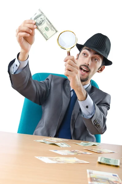 Detective detecting fake dollar banknotes — Stock Photo, Image