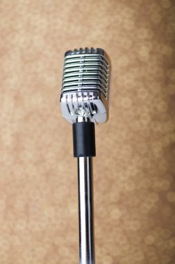 Old vintage microphone on background clipart