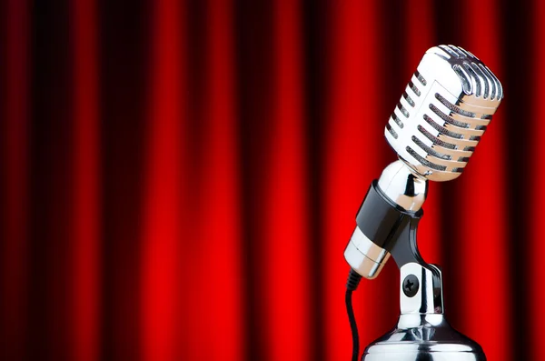 stock image Vintage microphone against the background