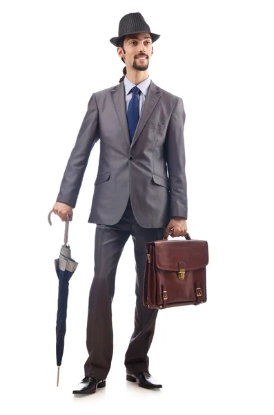 Geschäftsmann mit Regenschirm auf weißem Grund — Stockfoto