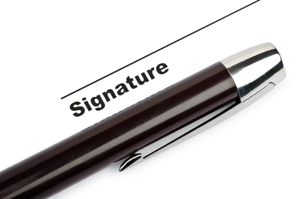 Ручка и подпись изолированы на белом — стоковое фото