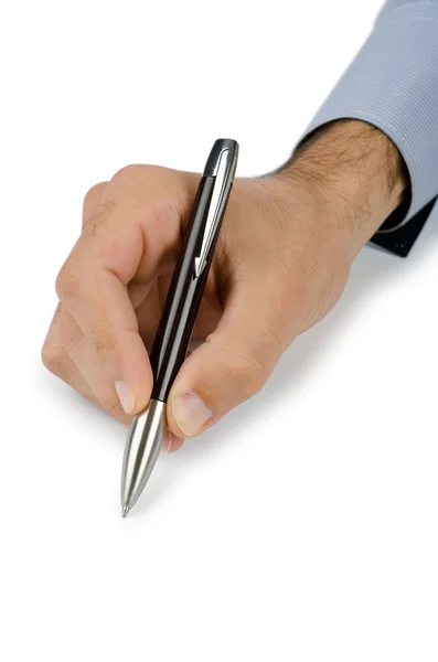 Рука с ручкой на белом — стоковое фото