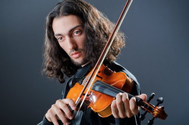 Violin player playing the intstrument clipart