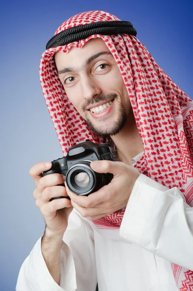 Arab photographer in studio shooting — Stock Photo, Image