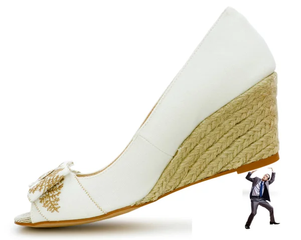 Ayakkabı ve erkek ile kadın hakimiyeti kavramı — Stok fotoğraf