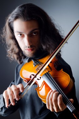 Violin player playing the intstrument clipart