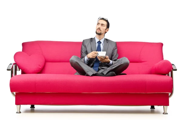 Man sitting in the sofa — Stock Photo, Image