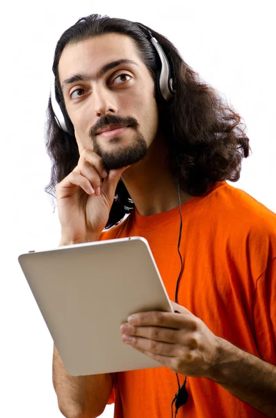 Estudante ouvir música com computador tablet — Fotografia de Stock