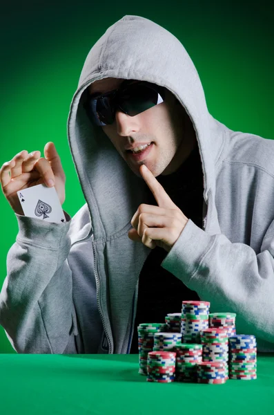 Player in casino and chips — Stock Photo, Image