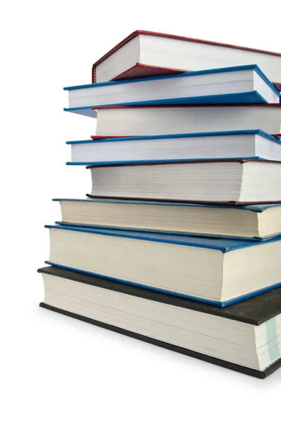 Böcker i hög stack isolerad på vitt — Stockfoto