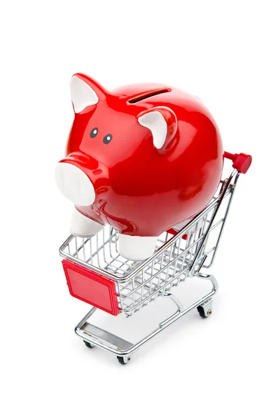 Banco porquinho e carrinho de compras em branco — Fotografia de Stock