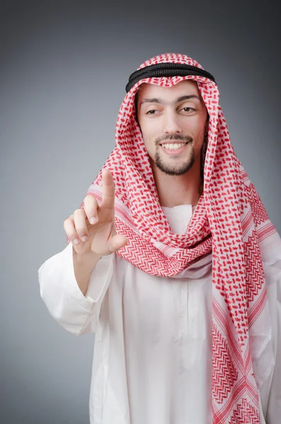 Arab pushing virtual buttons — Stock Photo, Image