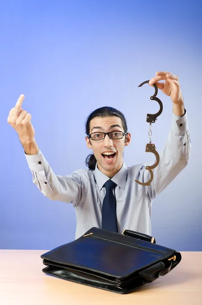 Businessman with handcuffs in concept — Stock Photo, Image